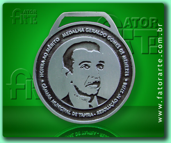 Medalha Geraldo Gomes de Menezes,  fundida formato personalizado, com aplicação de cores, fita de cetim ou poliéster 
