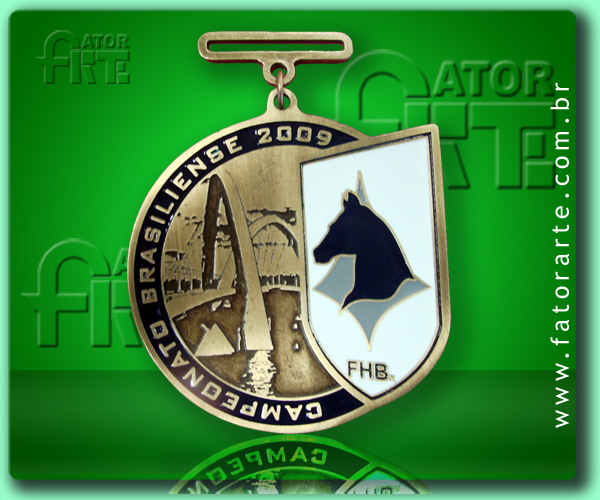 Medalha Campeonato Brasiliense 2009 FHBr, fundida formato personalizado, com aplicação de cores, fita de cetim ou poliéster 